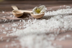 Salt on table with spoons