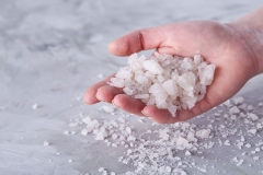 Salt crystals in women's hand